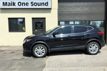 White 2019 Nissan Qashqai with dark privacy tint installed in North Bay